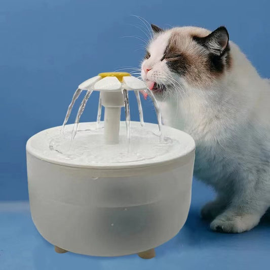Cat drinking from USB Electric Pet Water Fountain – 1.2L Automatic Dispenser with Flower Spout